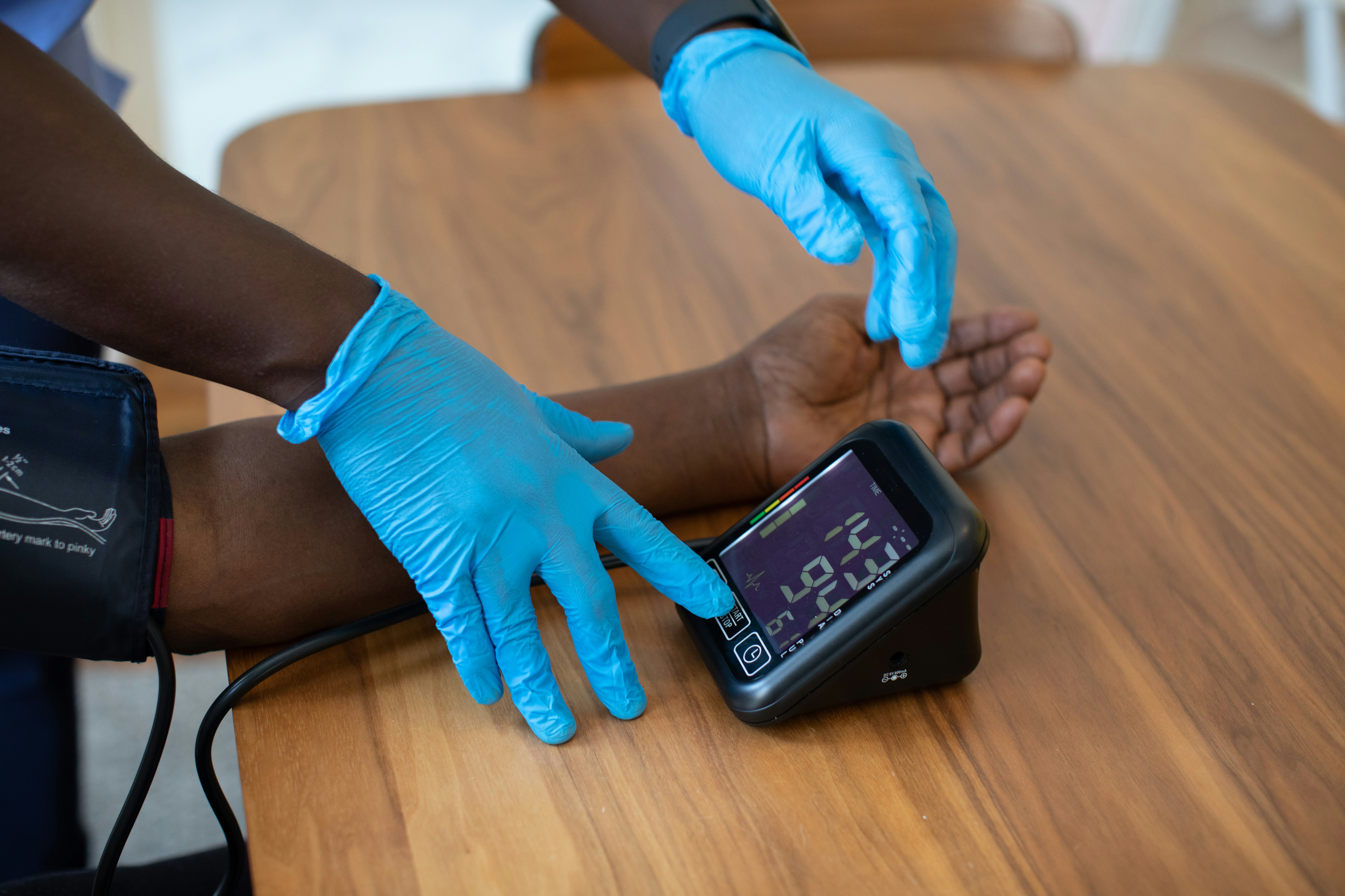 Doctor monitoring patient blood pressure — hypertension care at D Reddy Medical Group Palm Springs